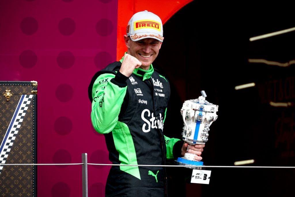 NORTHAMPTON, ENGLAND - JULY 06: Third placed Nico Hulkenberg of Germany and Stake F1 Team Kick Sauber on the podium with his trophy during the F1 Grand Prix of Great Britain at Silverstone Circuit on July 06, 2025 in Northampton, England. (Photo by Clive Rose/Getty Images)