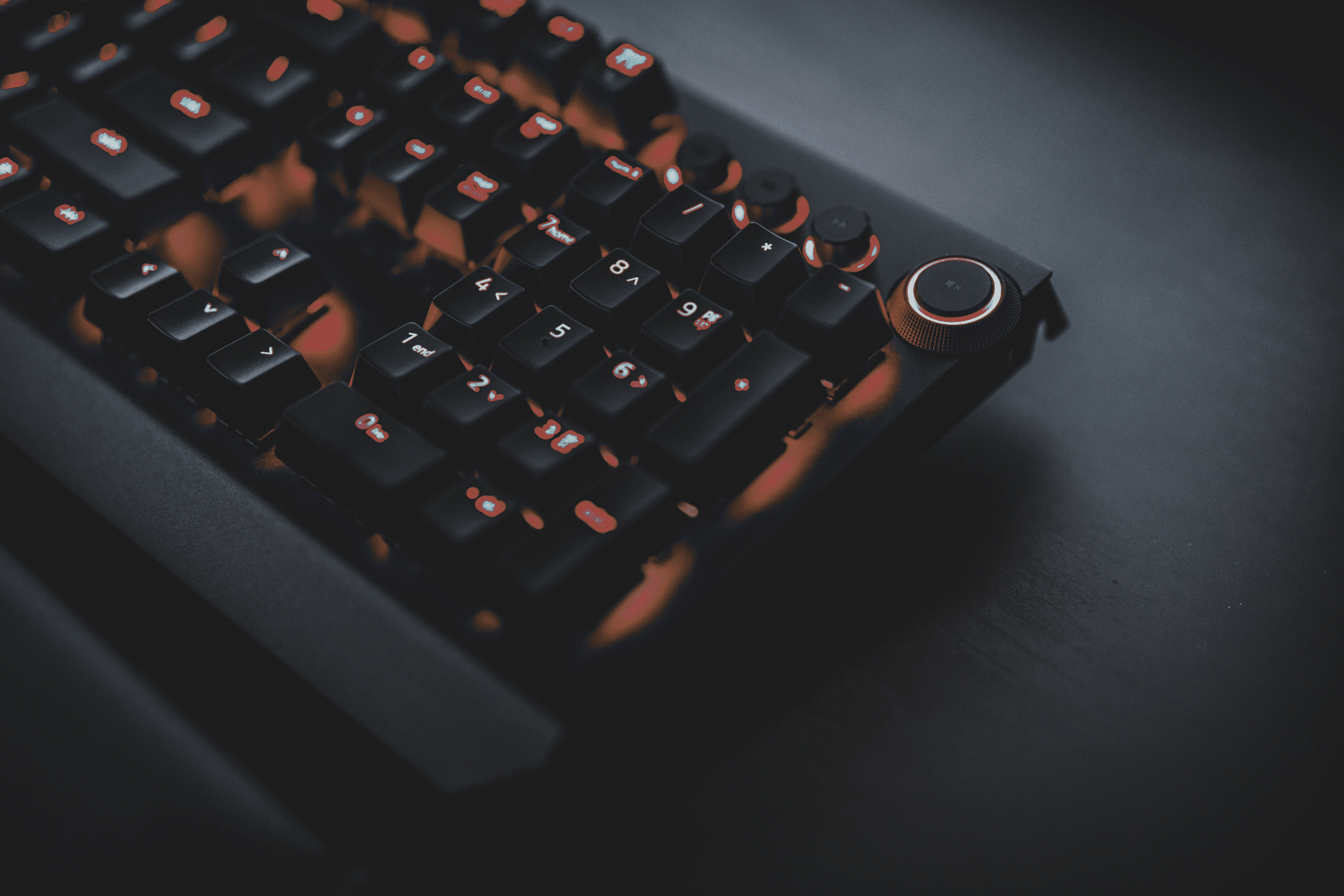Close-up on the numerical pad of an orange and black keyboard. » admin by request » admin by request