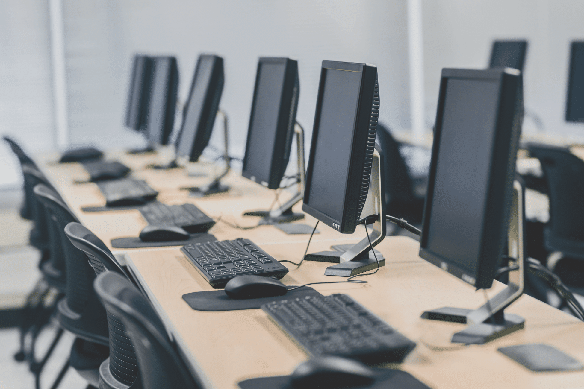 A row of 6 computers in an office. » admin by request » admin by request