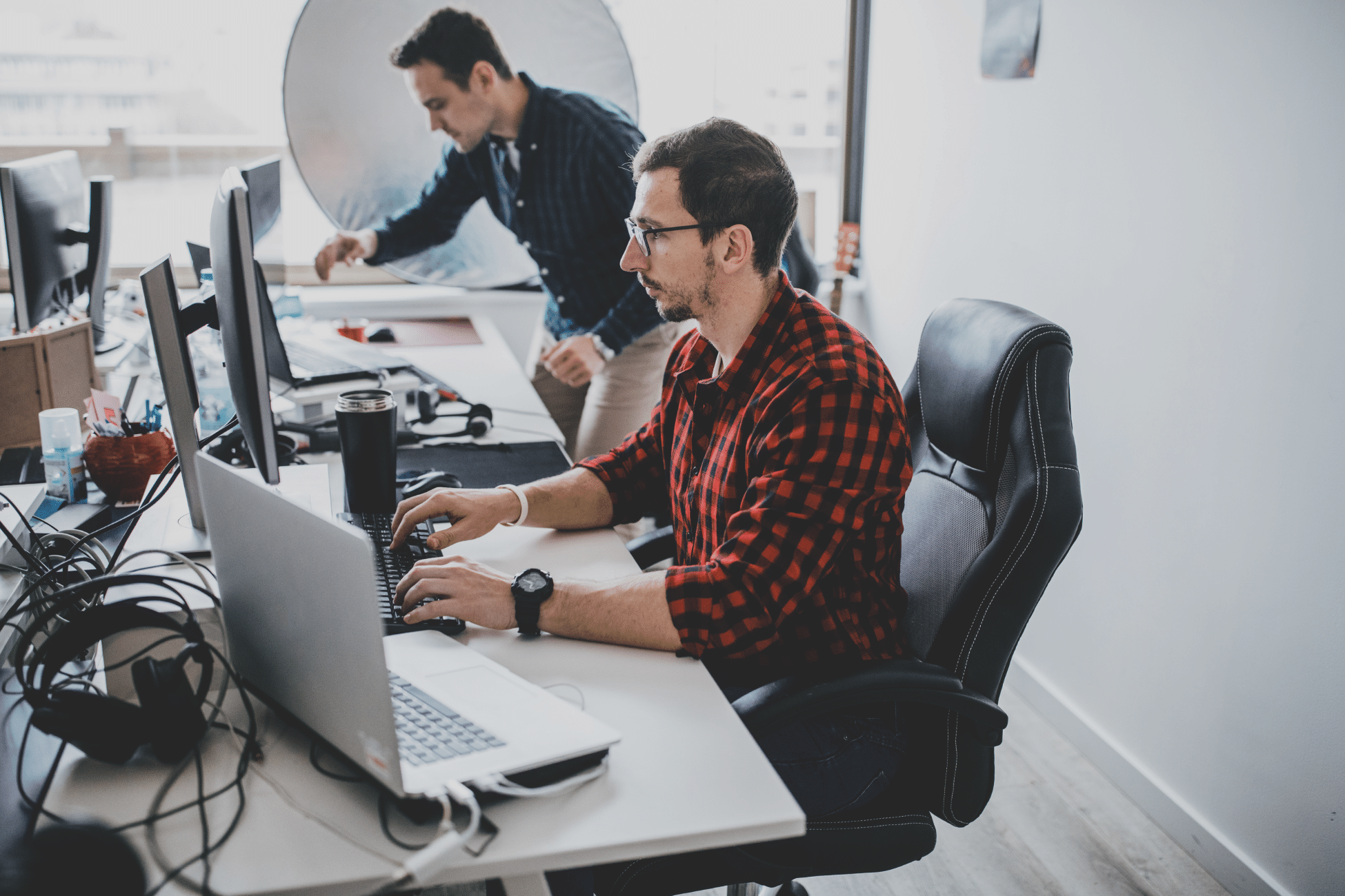 Man in red shirt with glasses on his computer. » admin by request » admin by request