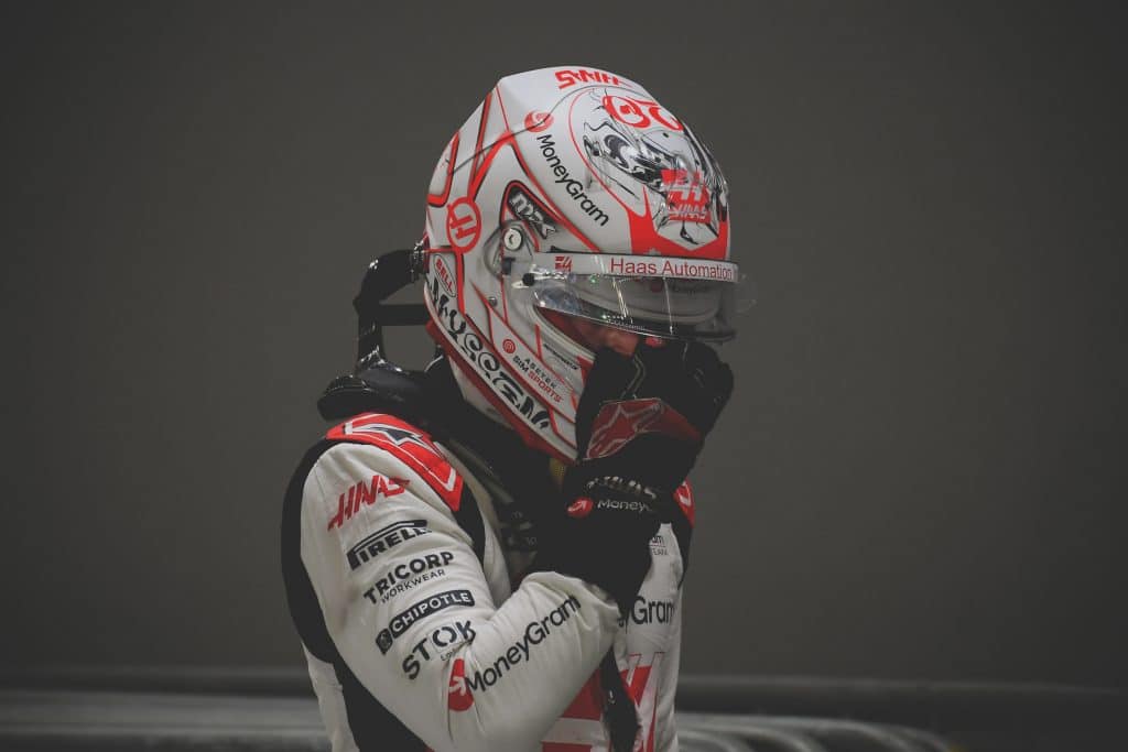 Kevin magnussen at the singapore grand prix adjusting his helmet 2023 » admin by request