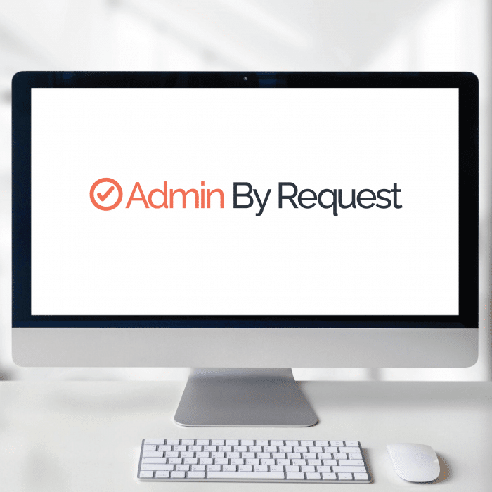 Feature focus 1-12 » admin by request Desktop in a bright room with the admin by request logo on the screen » admin by request