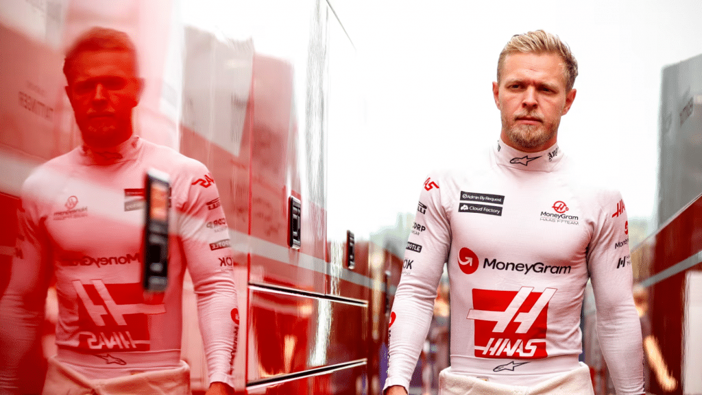 Admin by request sponsored kevin magnussen walking between trailers with race suit on » admin by request » admin by request