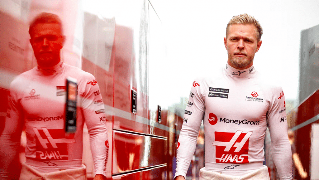 Admin by request sponsored kevin magnussen walking between trailers with race suit on » admin by request